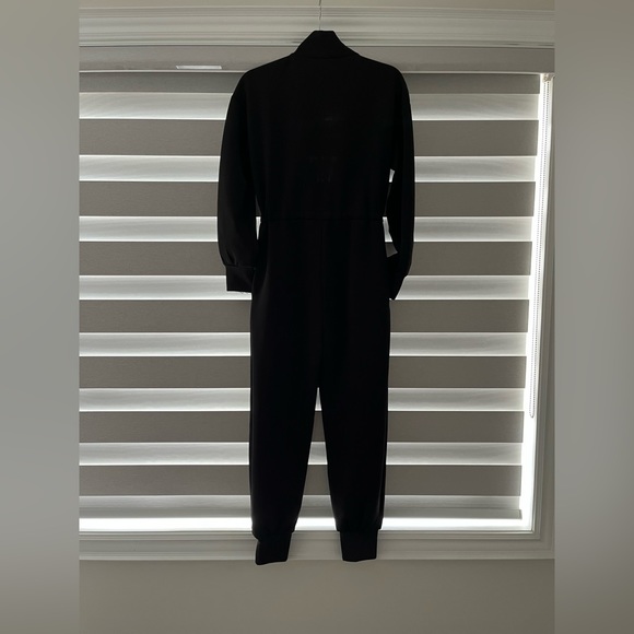 Black high neck, long sleeve, cuffed jumpsuit. Worn once SIZE S. - Picture 3 of 5